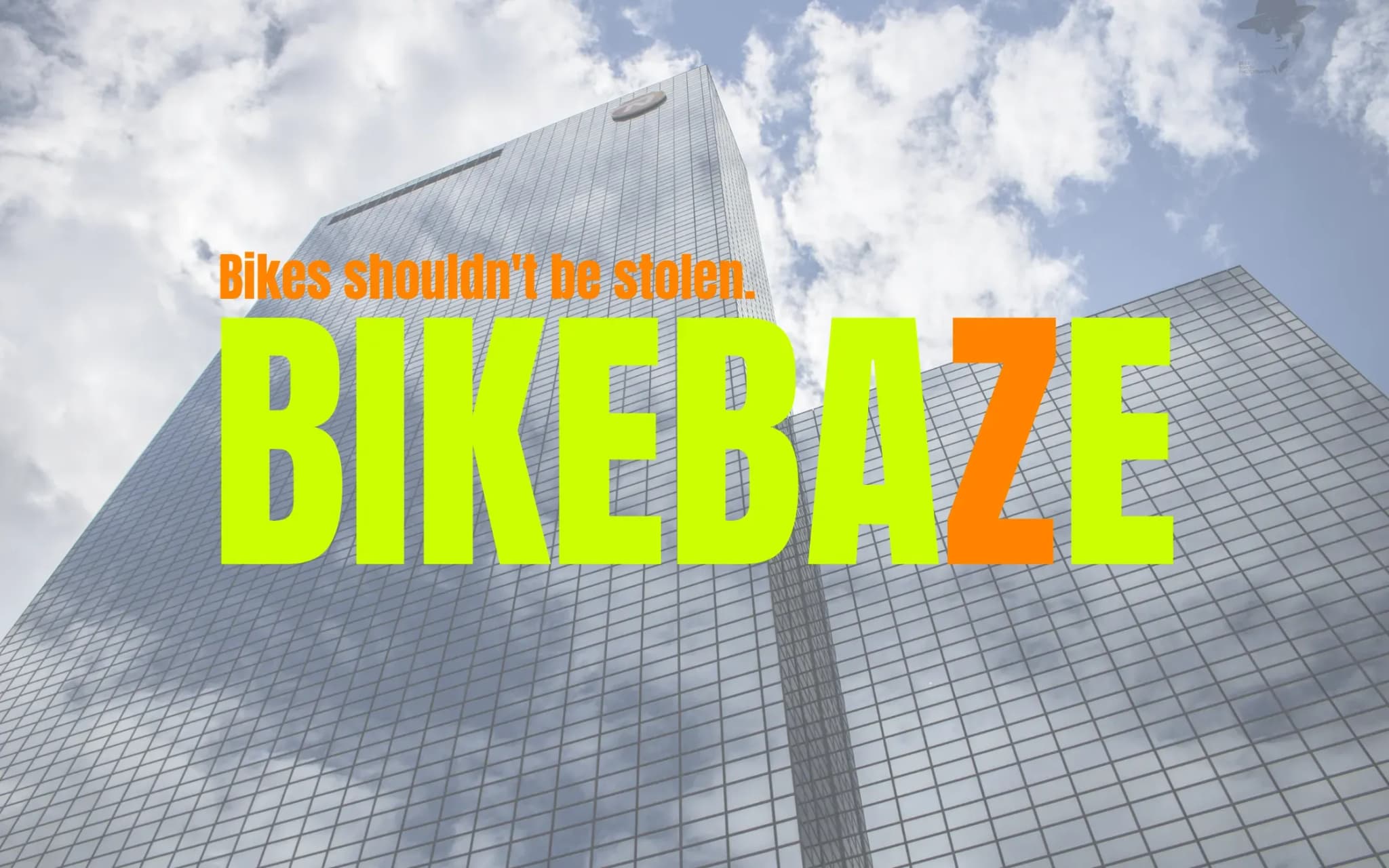 BIKEBAZE-logo over een opwaartse foto van een glazen kantoortoren met de tekst Bikes shouldn't be stolen.