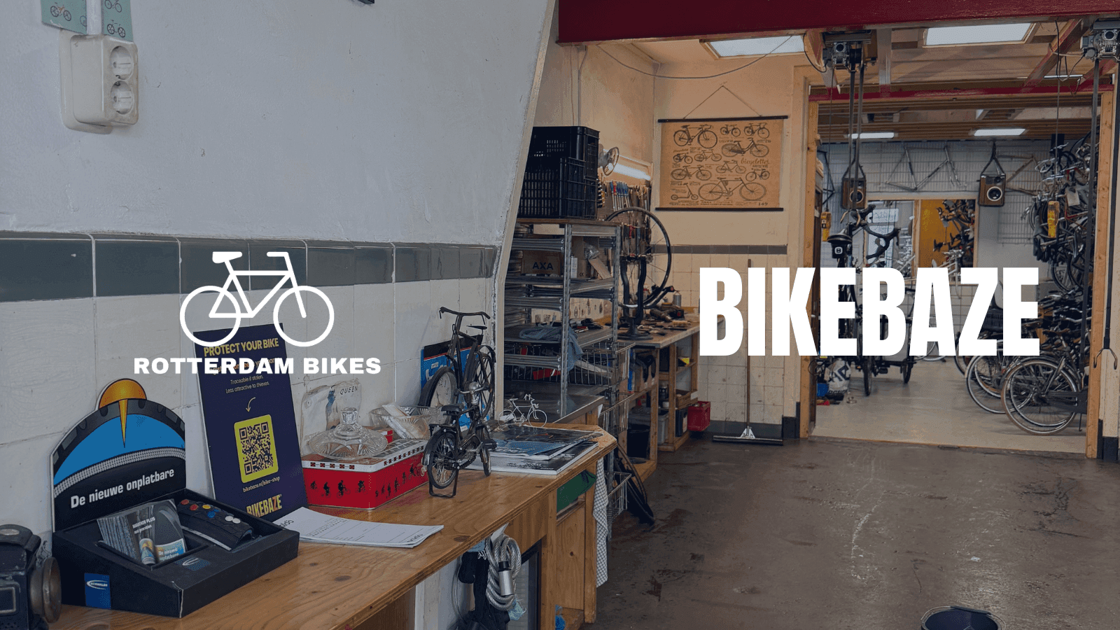 Rotterdam Bikes workshop with a BIKEBAZE poster on the counter, bikes in the workshop behind it, and the Rotterdam Bikes and BIKEBAZE logos.