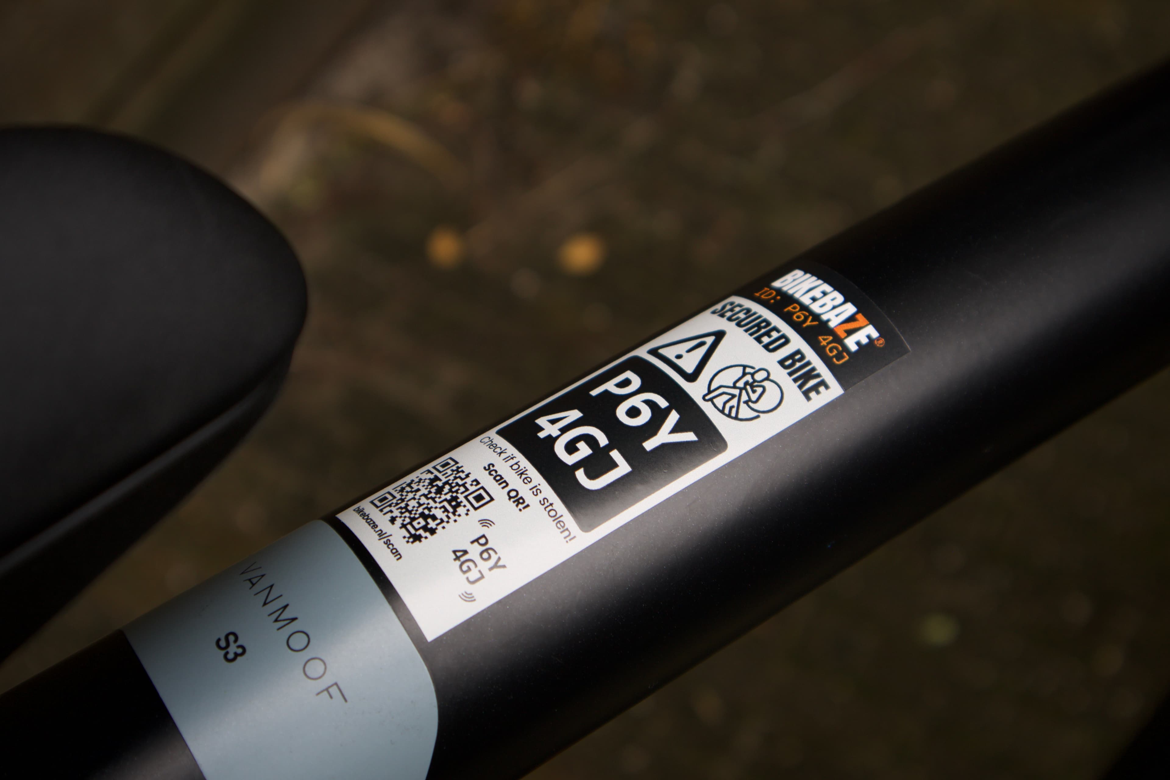 Grey BIKEBAZE SafeTag sticker on a bike frame